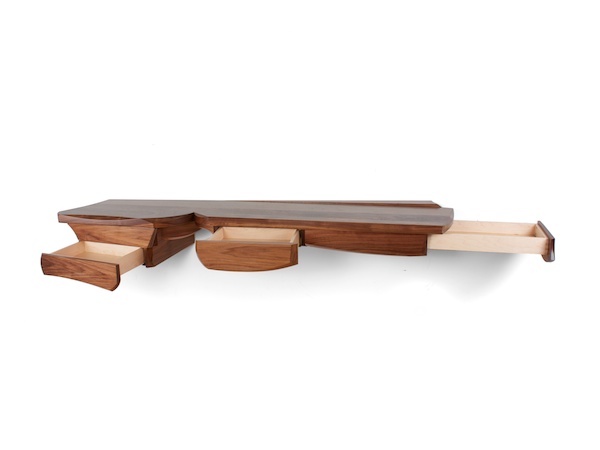 sculptural walnut console with four drawers