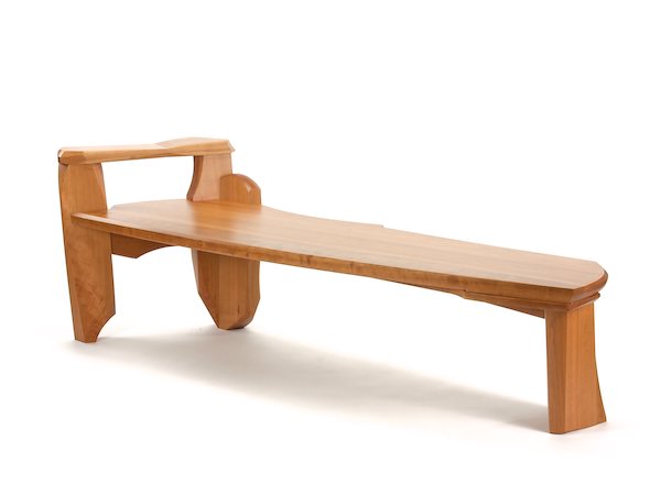 Bench #12- modern wood bench made of cherry with one arm rest and dramatic movement