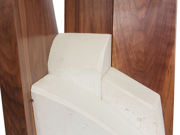 detail of cast concrete core and walnut uprights