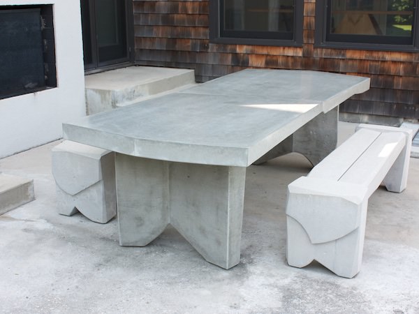 Modern outdoor dining table in cast concrete